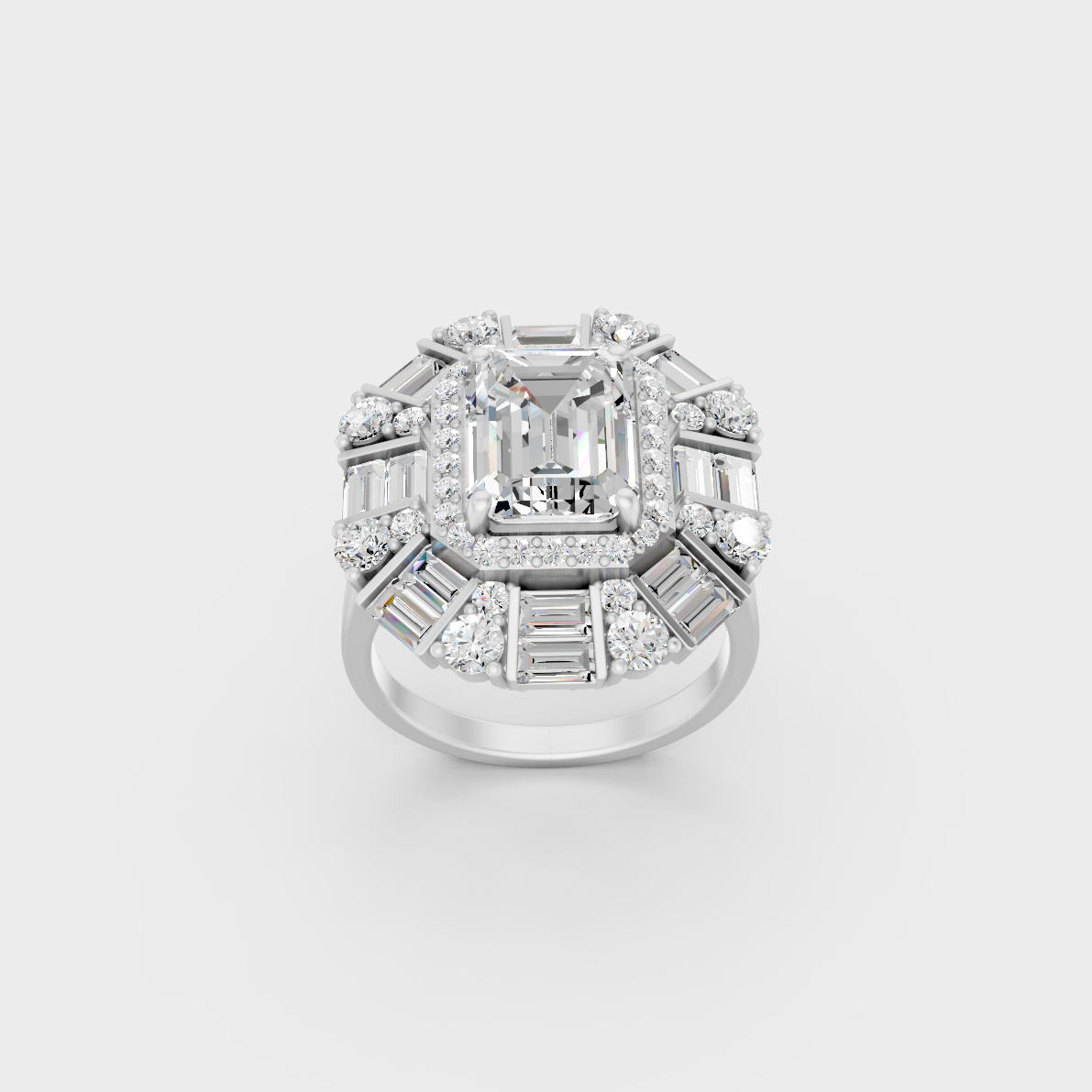 Front view of an Ethical Luxury Statement Ring with Emerald, Round, and Baguette Brilliant Diamonds secured in 14K White Gold.