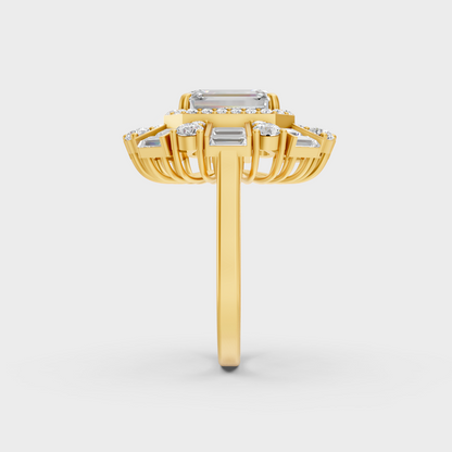 On-model hand wearing a 4.48ct Emerald, Round, and Baguette Diamond Cocktail Ring displaying its Brilliant Sparkle in 9K Yellow Gold.