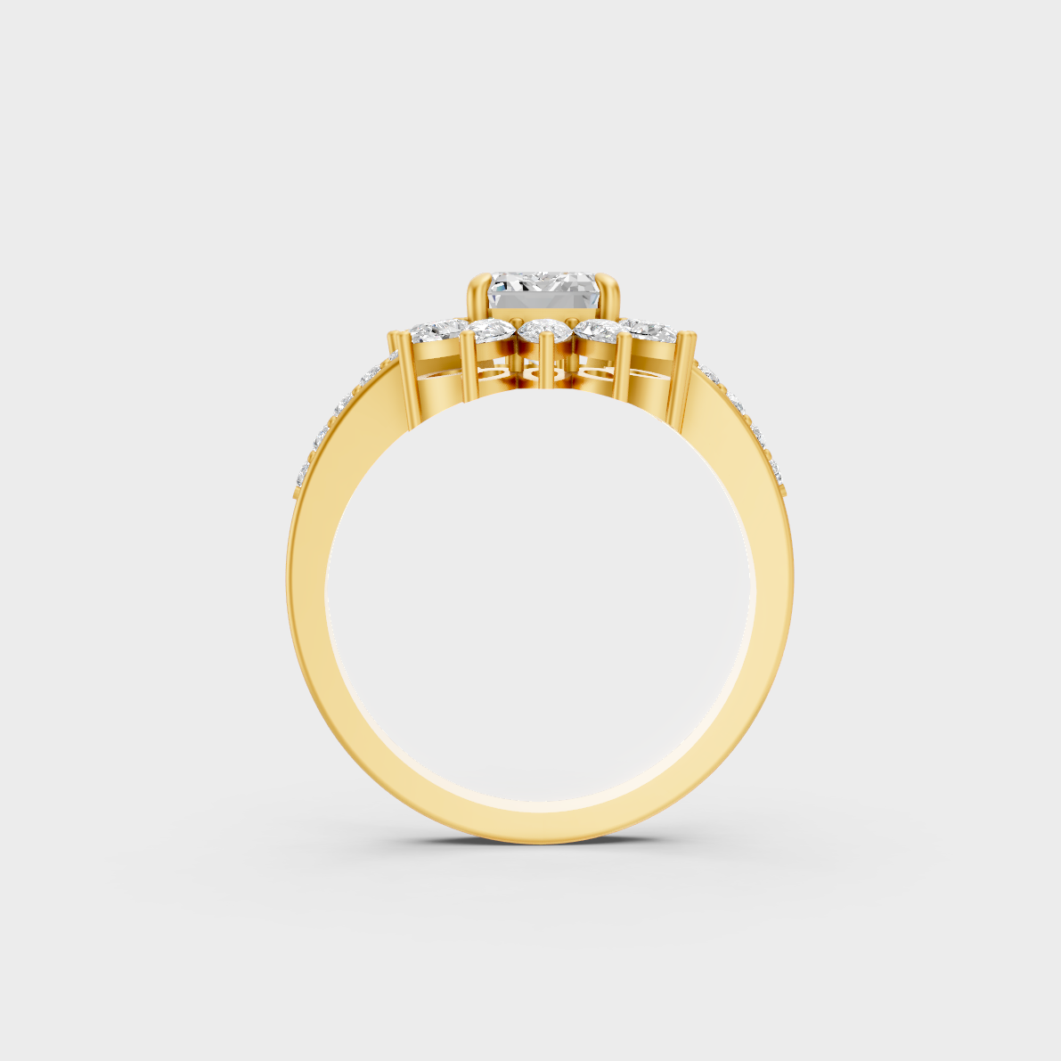 On-model hand wearing a 2.13ct Emerald, Round, and Pear Diamond Cocktail Ring displaying its Brilliant Sparkle in 9K Yellow Gold.