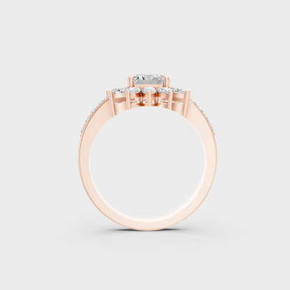 Top-down studio shot displaying the immense Brilliant Sparkle of a 2.13ct Emerald, Round, and Pear Diamond Ring in 9K Rose Gold.