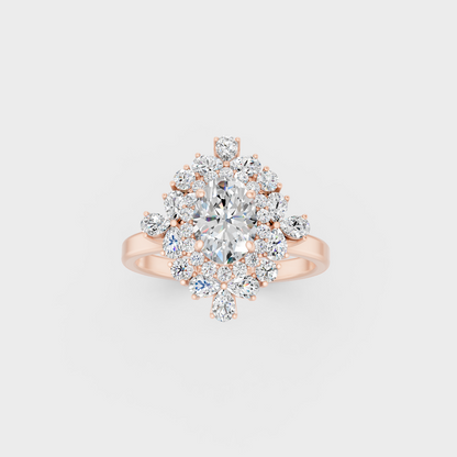 Stunning cluster of Oval, Round, and Pear Cut Diamonds exuding Ethical Luxury on an 18K Rose Gold Band.