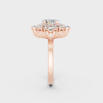 A Sustainable Lab-Created Diamond Statement Ring catching the light on a warm 18K Rose Gold Setting.