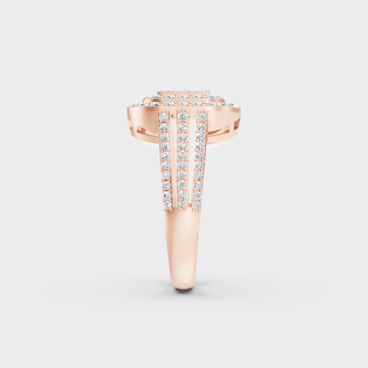 A Sustainable Lab-Created Diamond Statement Ring catching the light on a warm 18K Rose Gold Band.