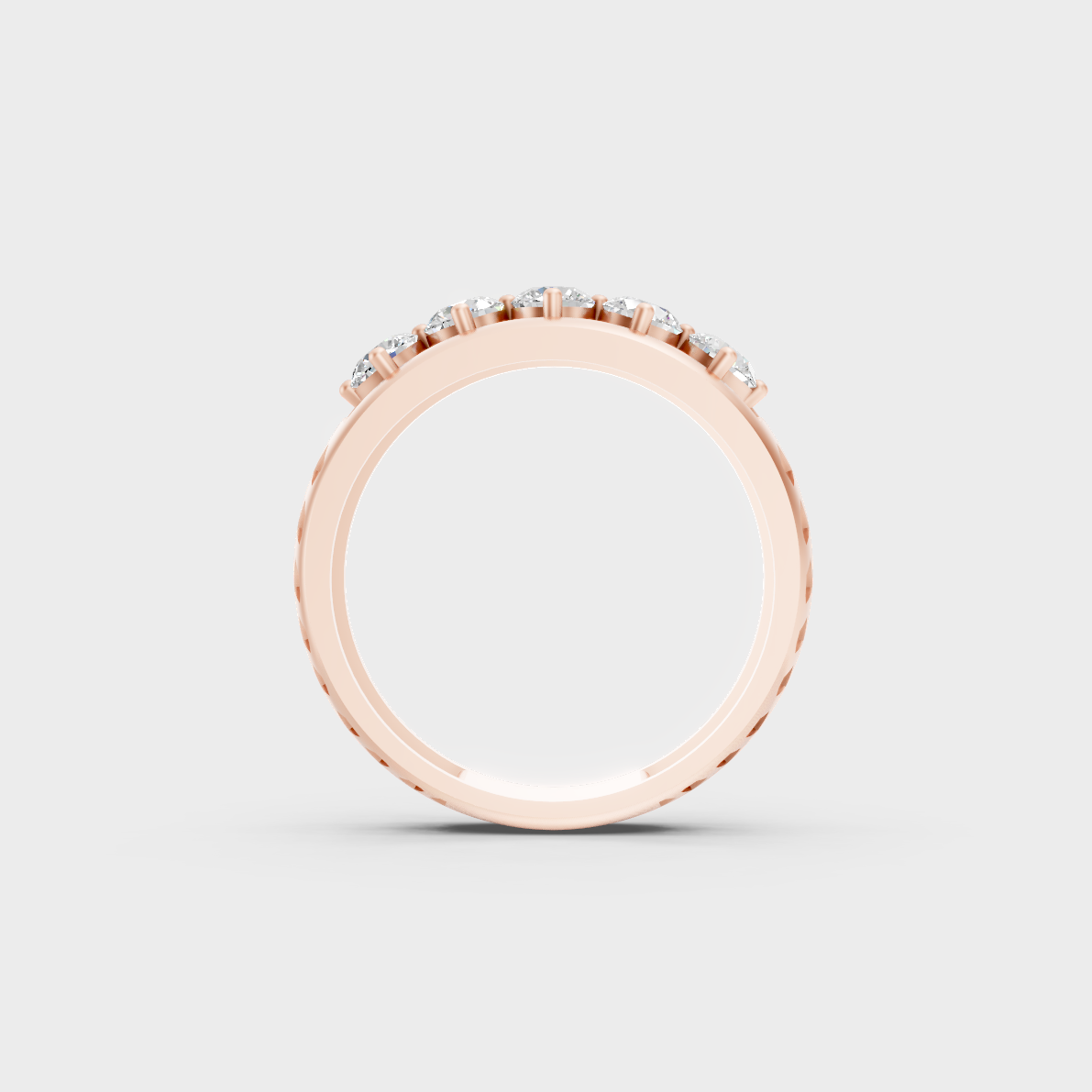 Top-down studio shot displaying the immense Brilliant Sparkle of a 0.67ct Round Diamond Band in 9K Rose Gold.