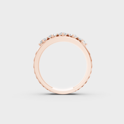 Top-down studio shot displaying the immense Brilliant Sparkle of a 0.67ct Round Diamond Band in 9K Rose Gold.