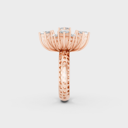 A Sustainable Lab-Created Diamond Statement Ring catching the light on a warm 18K Rose Gold Band.