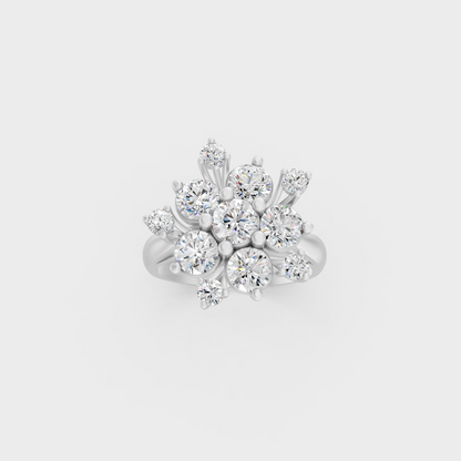 Front view of an Ethical Luxury Statement Ring with a Round Brilliant Diamond secured in 14K White Gold.