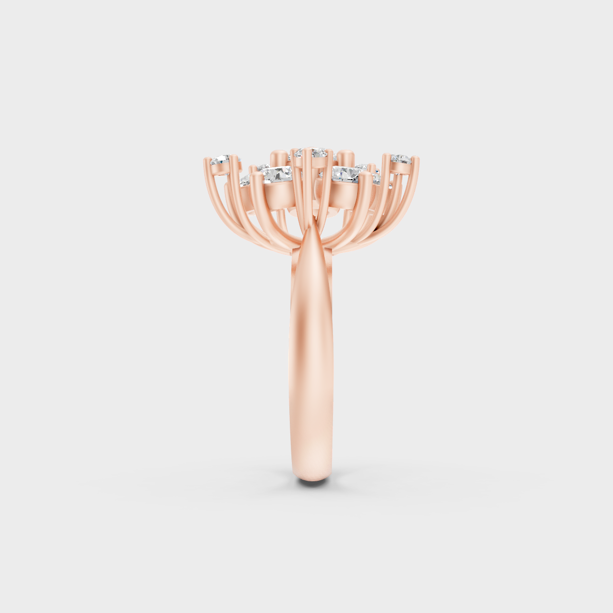 A Sustainable Lab-Created Diamond Statement Ring catching the light on a warm 18K Rose Gold Band.
