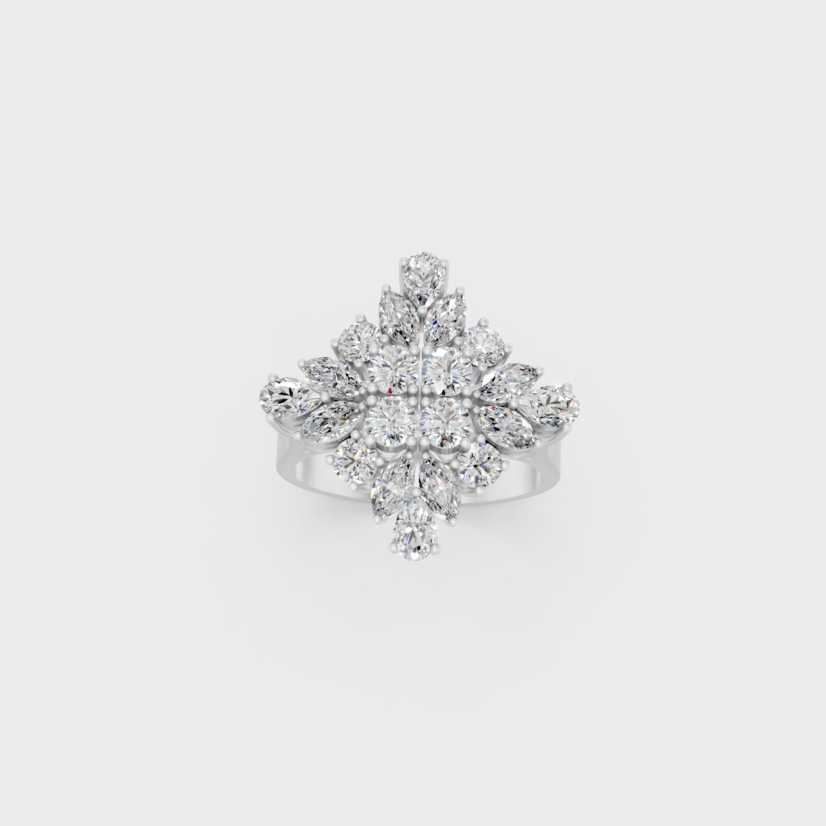 Front view of an Ethical Luxury Statement Ring with Marquise, Pear, and Round Brilliant Diamonds secured in 14K White Gold.