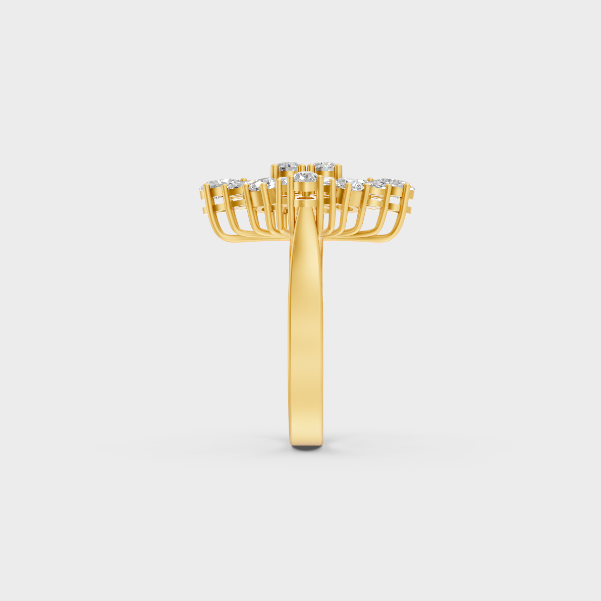 Top-down macro photo of an Ethical Luxury Mixed Shape Diamond Ring cast in classic 18K Yellow Gold.