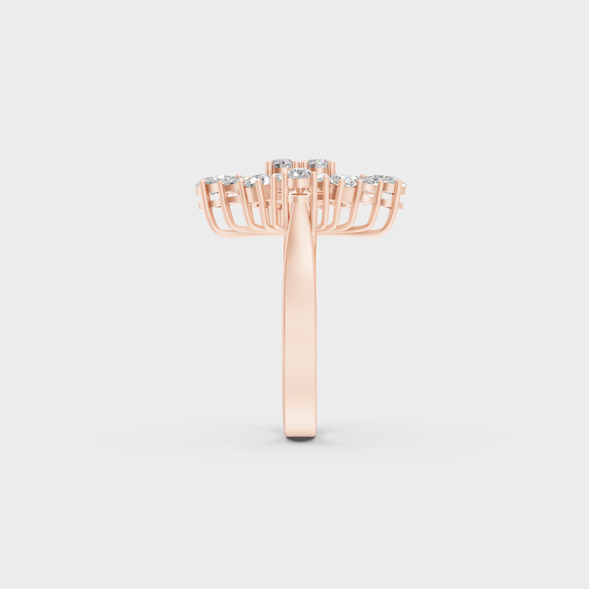 A Sustainable Lab-Created Diamond Statement Ring catching the light on a warm 18K Rose Gold Setting.