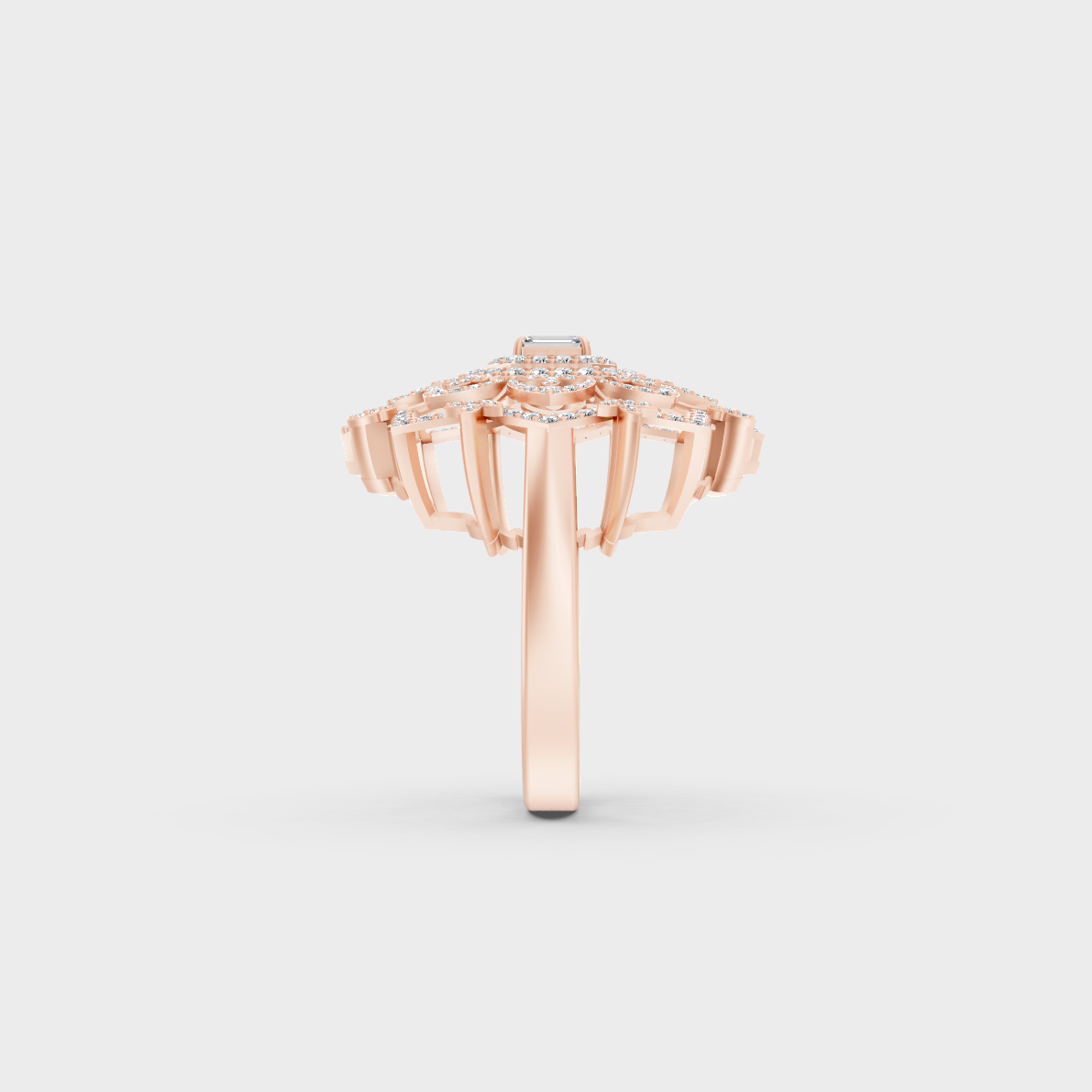 A Sustainable Lab-Created Diamond Statement Ring catching the light on a warm 18K Rose Gold Band.