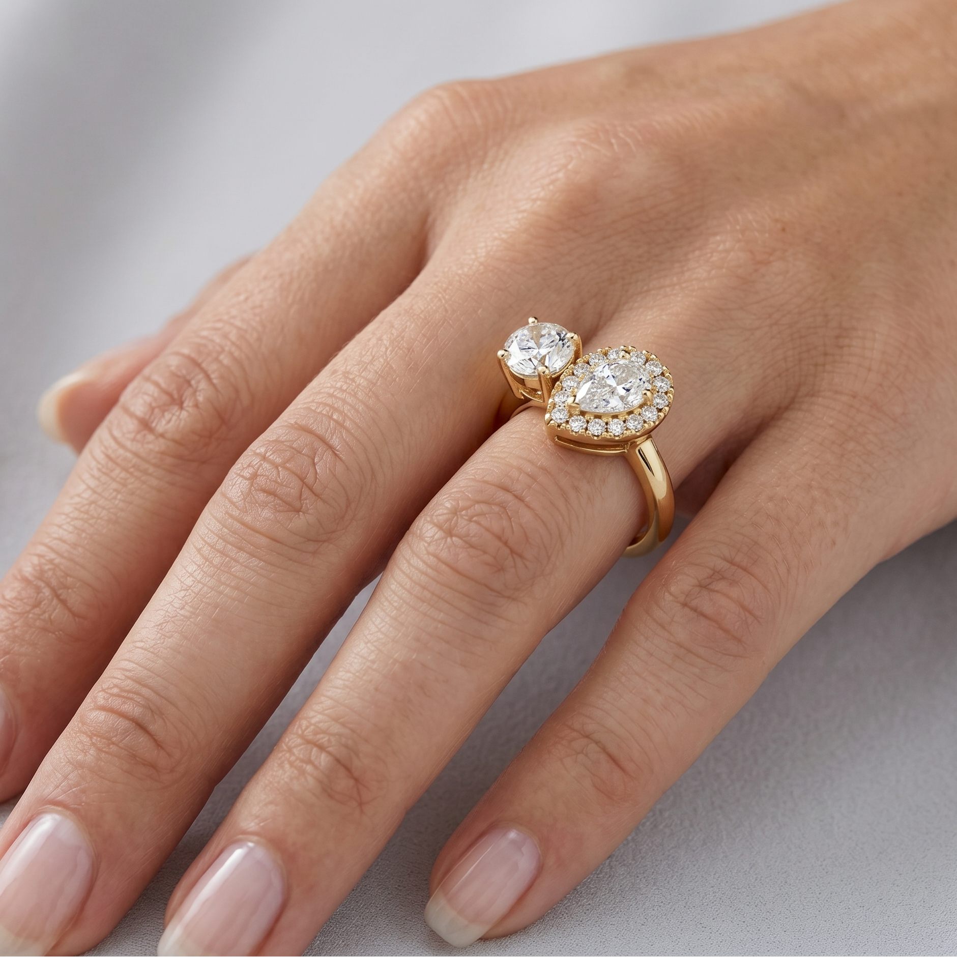 Yellow Gold Jewelry Showcasing Pear Lab Diamond Halo Design