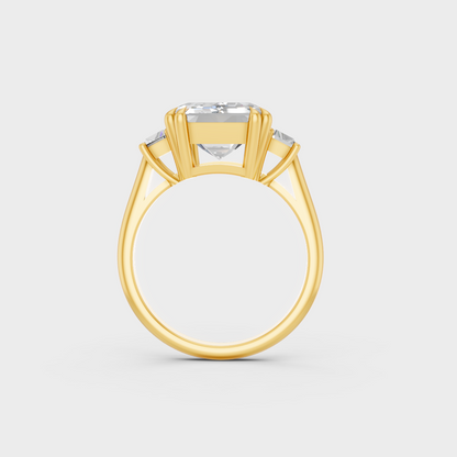 Luxury 4.28 Carat Emerald and Baguette Three-Stone Ring with architectural styling in 9K Yellow Gold.