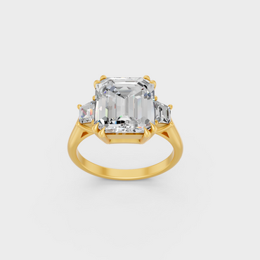 Majestic 4.28 Ct Emerald and Baguette Lab-Grown Diamond Engagement Ring in a polished 14K Yellow Gold setting.