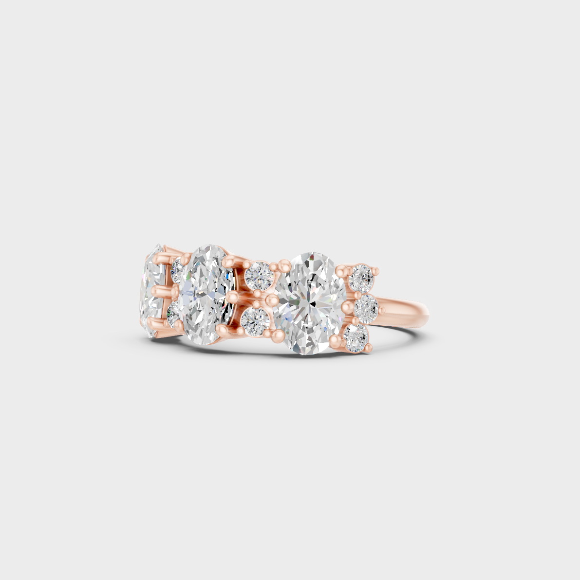 Distinctive 2.30 Carat Oval and Round-Cut Lab-Grown Diamond Band in 18K Rose Gold.