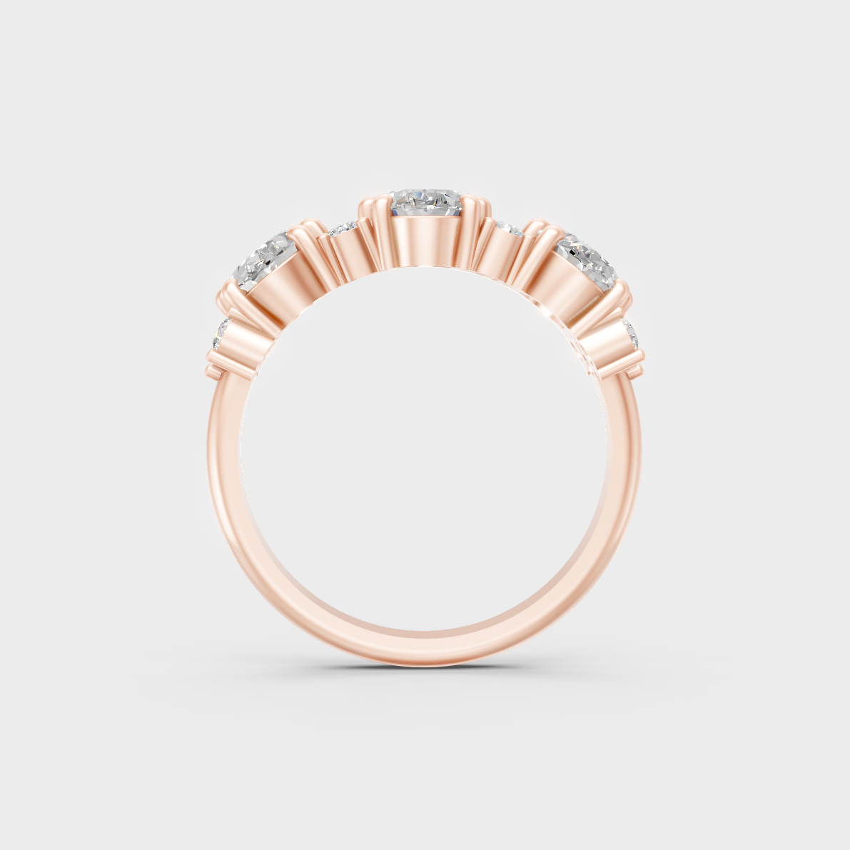 Unique 2.30 Carat Oval and Round Cut Lab-Grown Diamond Band with modern appeal in 9K Rose Gold.