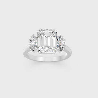 Heavyweight 3.14 Carat Emerald and Marquise Three-Stone Ring in pure 950 Platinum.