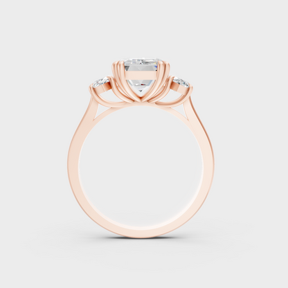 Unique 3.14 Carat Emerald and Marquise-Cut Lab-Grown Diamond Three-Stone Ring with modern appeal in 9K Rose Gold.