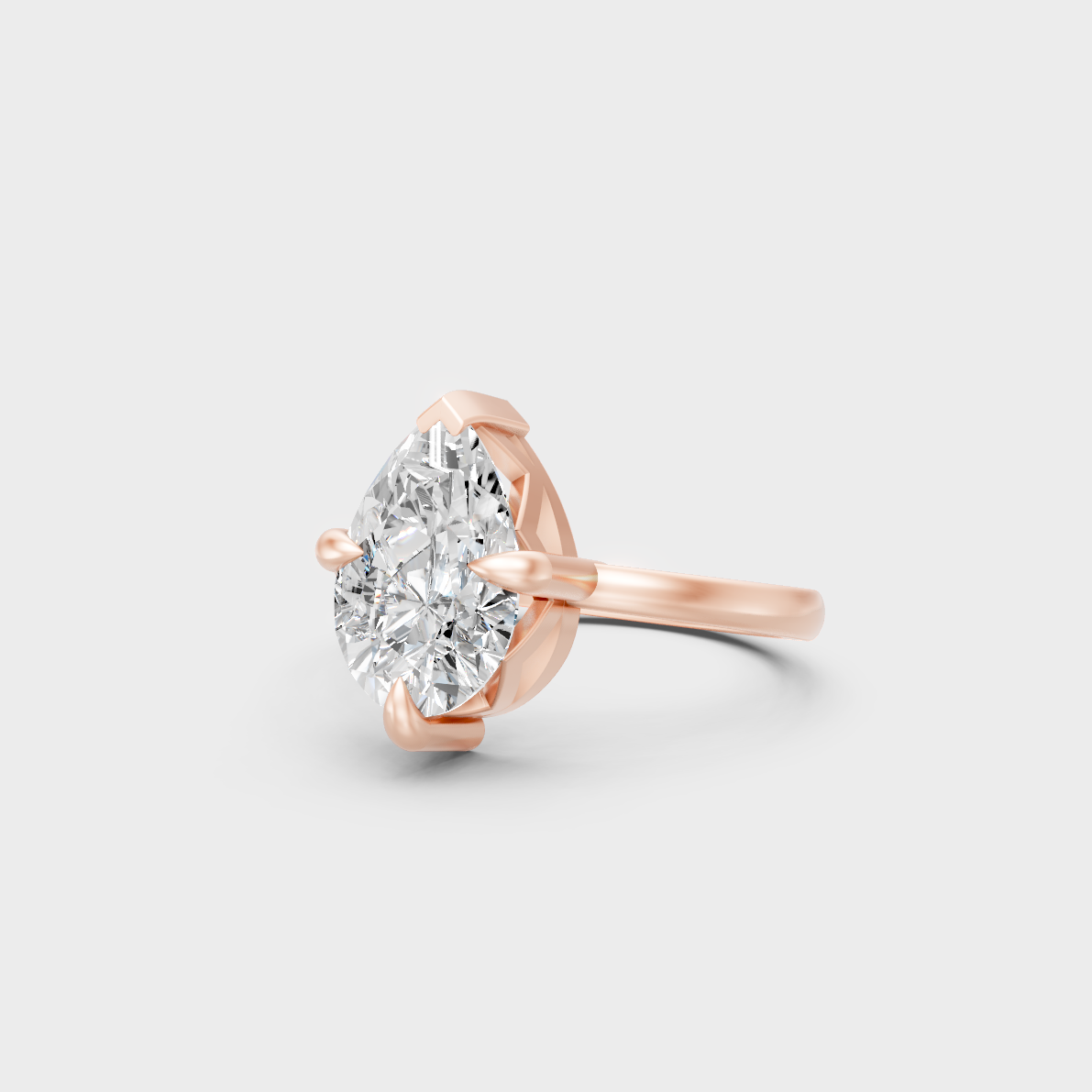 Distinctive 2 Carat Pear-Cut Lab-Grown Diamond Solitaire Ring in 18K Rose Gold.