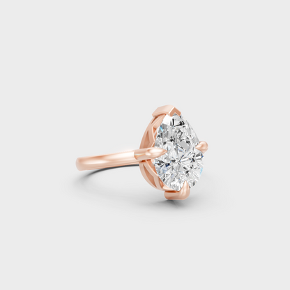 Stunning 2 Carat Pear-Cut Lab-Grown Diamond Solitaire Ring in a 14K Rose Gold setting.