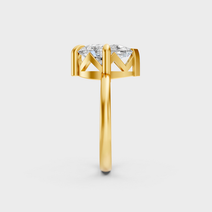 Close-Up View of 2 Ct Pear Lab-Grown Diamond Solitaire Ring with warm 18K Yellow Gold band.
