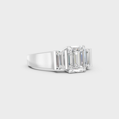 Modern 2.2 Carat Emerald and Baguette-Cut Lab-Grown Diamond Three-Stone Ring in a sleek 9K White Gold design.