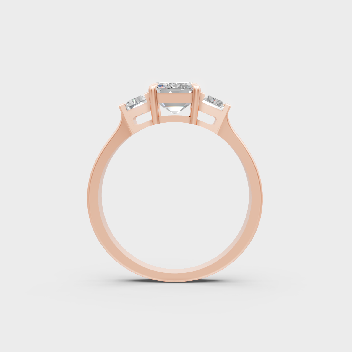 Unique 2.2 Carat Emerald and Baguette-Cut Lab-Grown Diamond Three-Stone Ring with modern appeal in 9K Rose Gold.