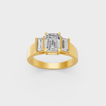 Majestic 2.2 Ct Emerald and Baguette Lab-Grown Diamond Engagement Ring in a polished 14K Yellow Gold setting.
