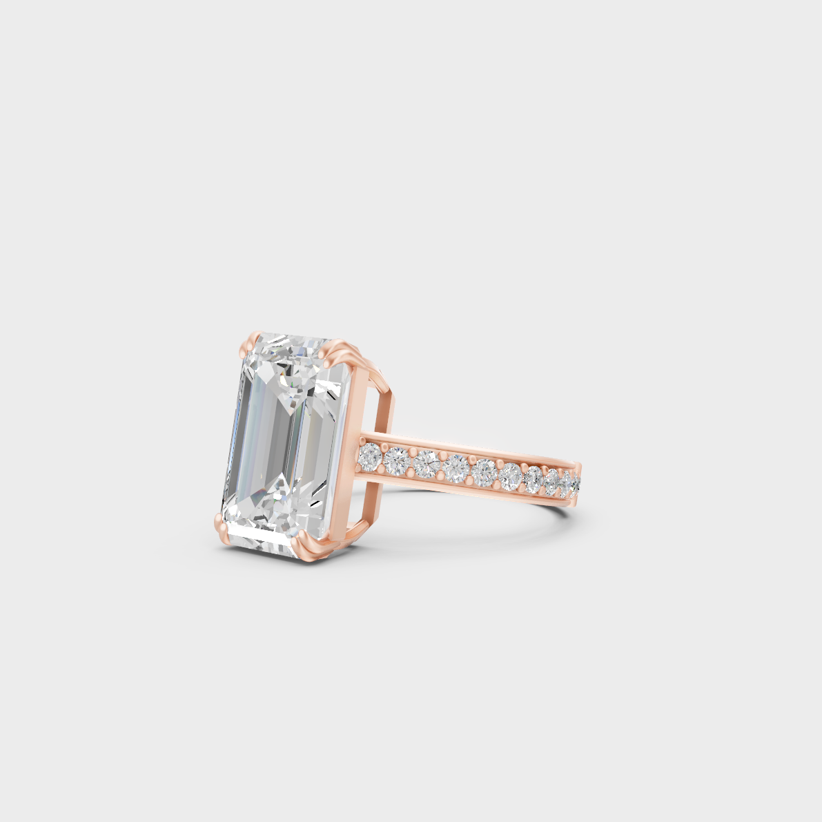 Distinctive 6 Carat Emerald and Round-Cut Lab-Grown Diamond Solitaire with Accents Ring in 18K Rose Gold.
