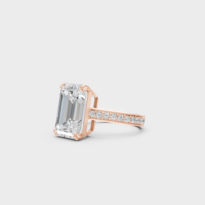 Distinctive 6 Carat Emerald and Round-Cut Lab-Grown Diamond Solitaire with Accents Ring in 18K Rose Gold.