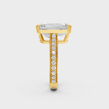 Close-Up View of 6 Ct Emerald Lab-Grown Diamond Accents Ring with warm 18K Yellow Gold band.