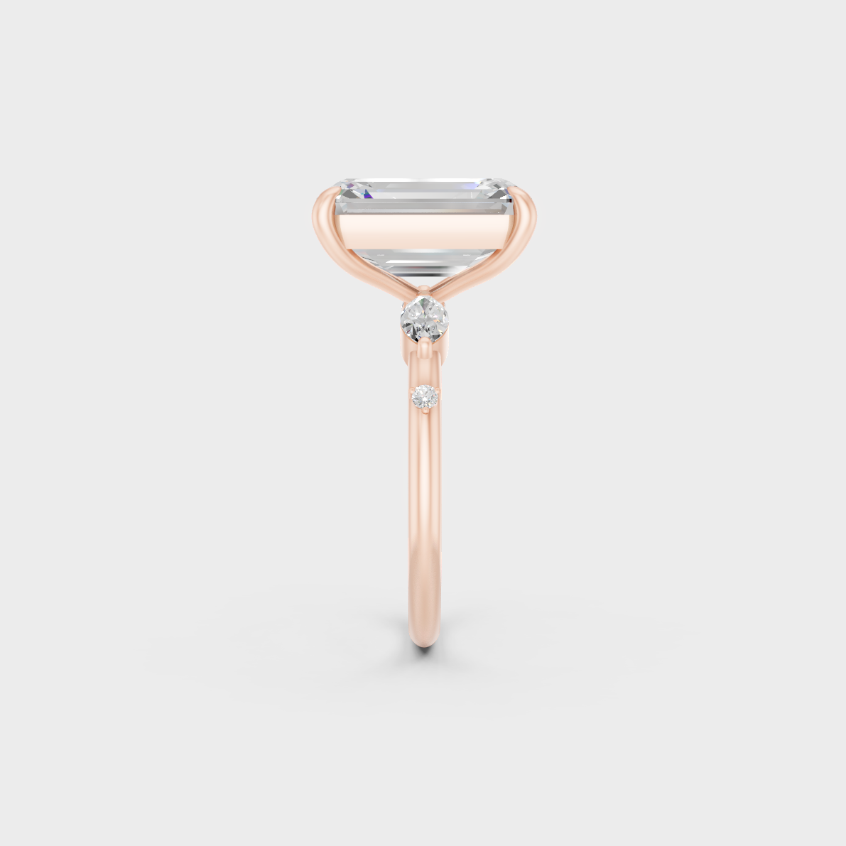 Hand shot showcasing 4.56 carat multishape lab grown diamond ring in rose gold