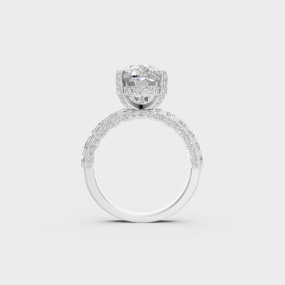 Hand model wearing 8.15 carat lab grown cushion cut diamond ring in platinum