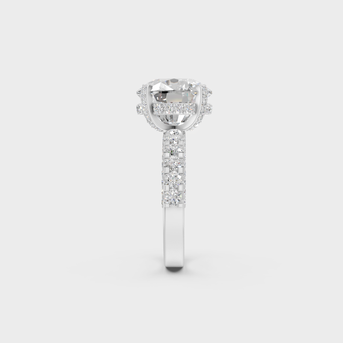 Profile view showing basket and prongs of 8.15ct cushion diamond ring in white gold