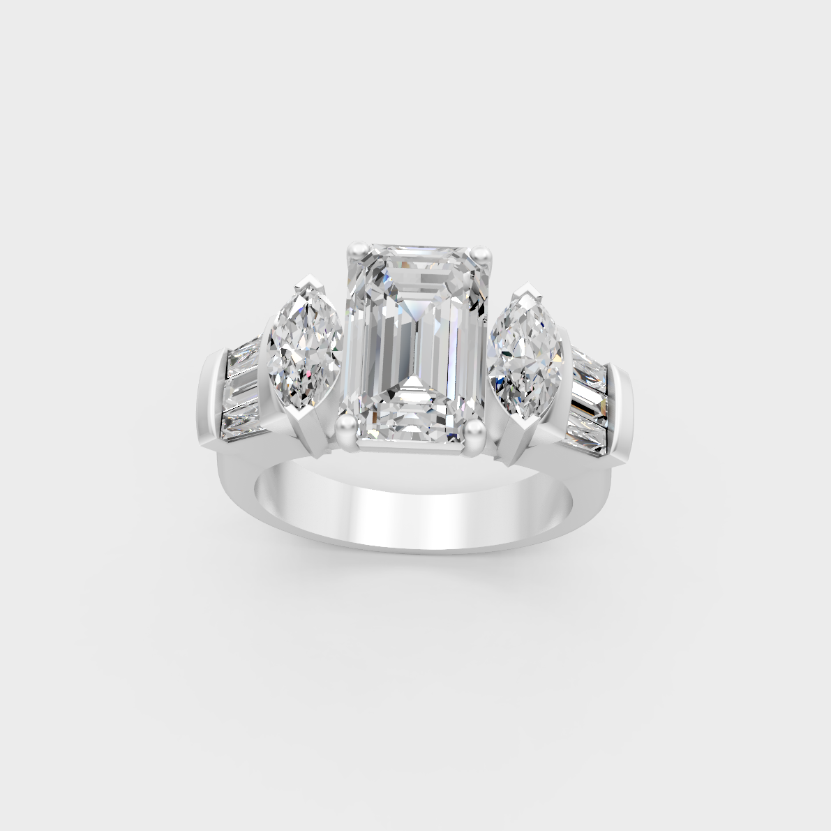 Detailed macro shot of emerald baguette and marquise cut diamonds in white metal setting