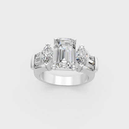 Detailed macro shot of emerald baguette and marquise cut diamonds in white metal setting