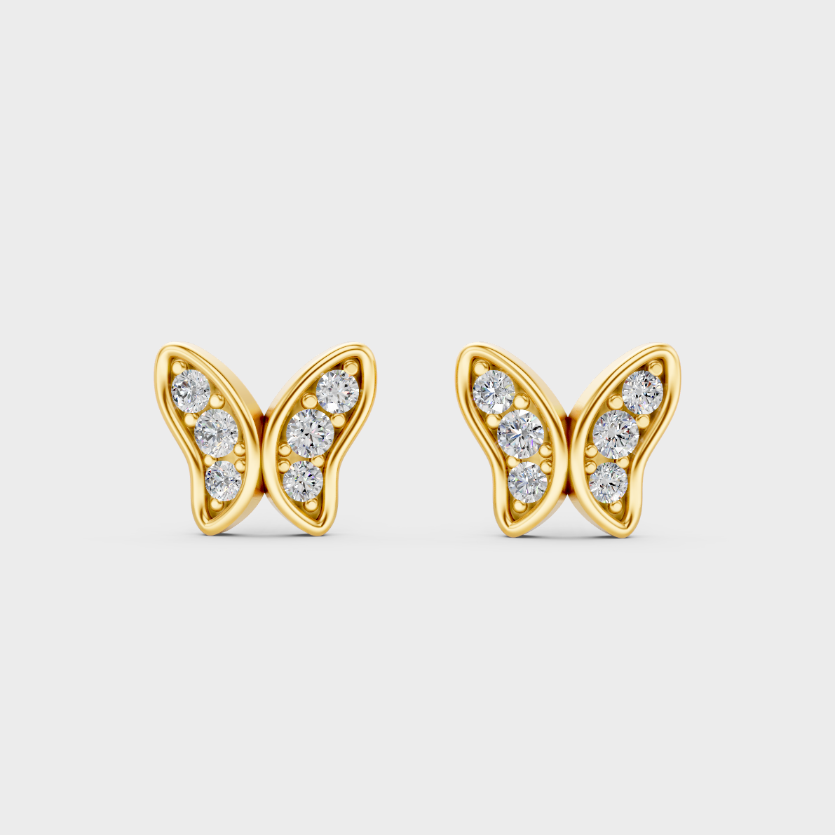 On-model ear wearing a pair of 0.63ct Round Lab Diamond Butterfly Studs in classic 9K Yellow Gold.