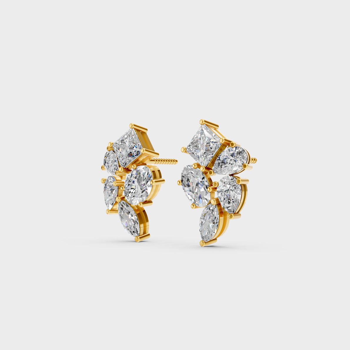 Side angle showing the secure backing and Brilliant Sparkle of Ethical Luxury Multishape Studs in 18K Yellow Gold.