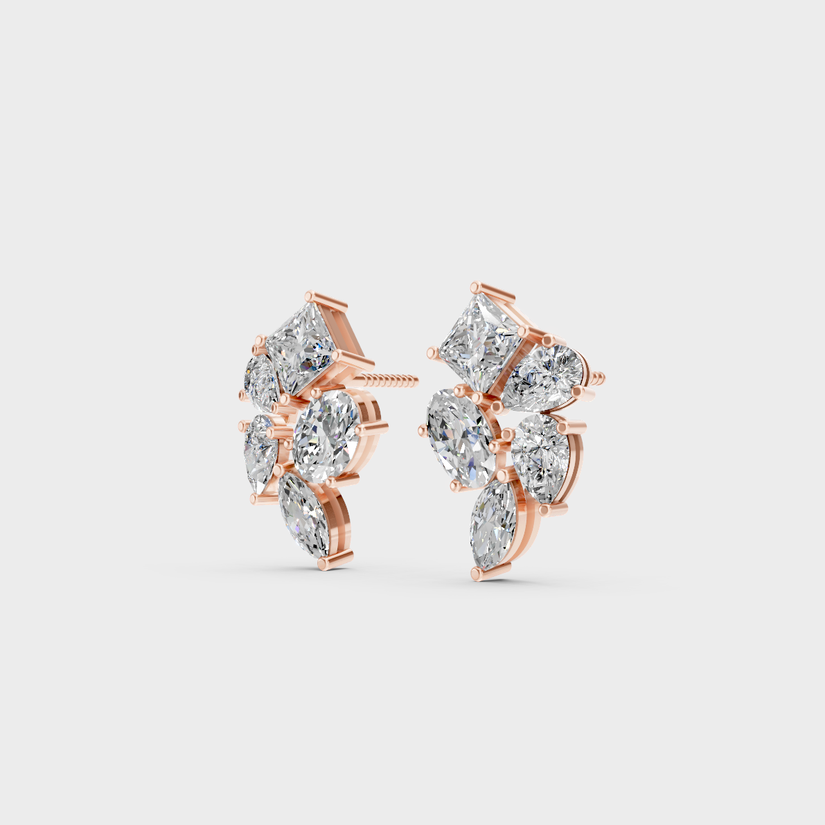 Top-down view displaying the Brilliant Sparkle of 2.40ct Princess, Pear, Oval, and Marquise Diamond Studs in 9K Rose Gold.
