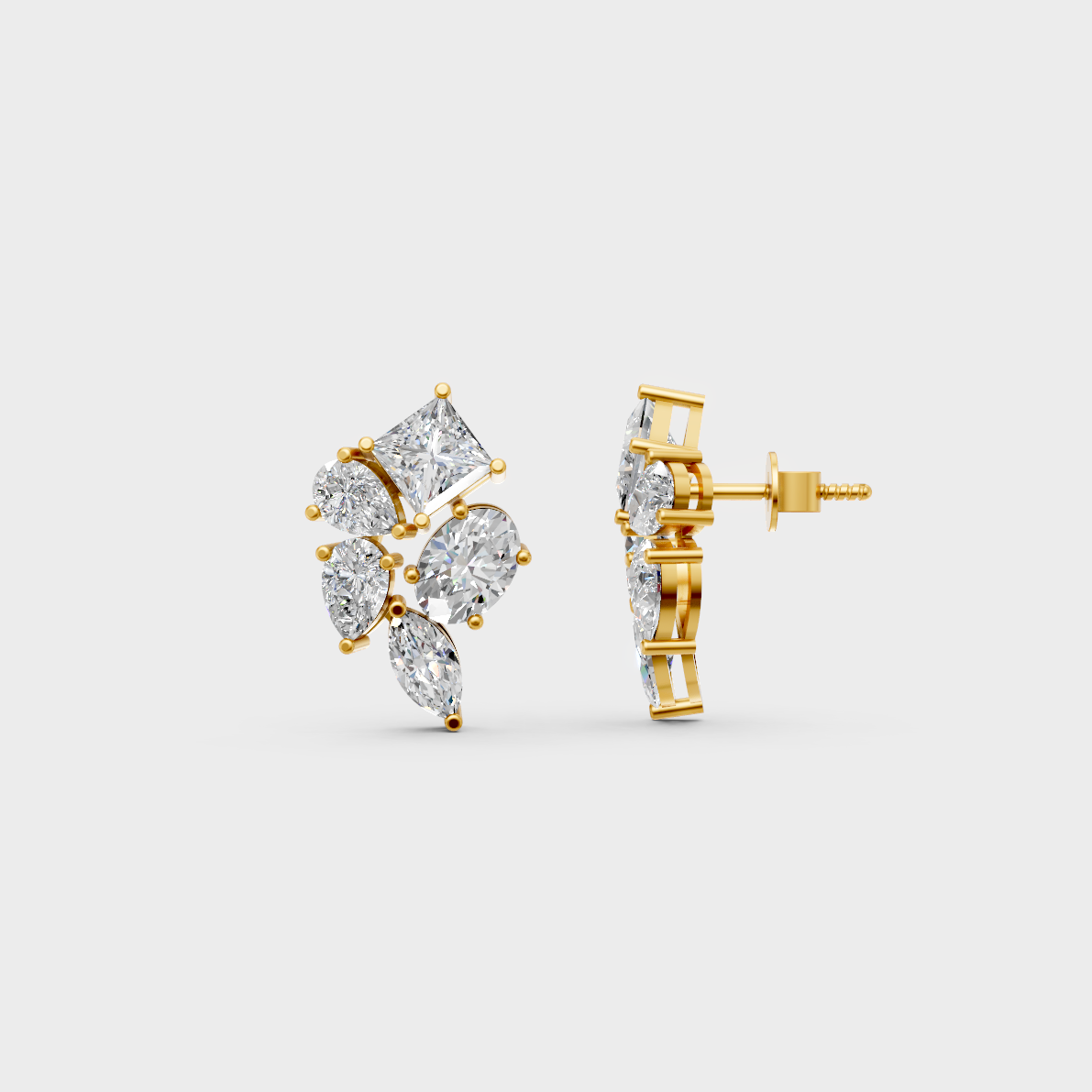Close-up shot of 2.40 Carat Multishape (Princess, Pear, Oval, Marquise) Lab-Grown Diamond Stud Earrings set in 14K Yellow Gold.