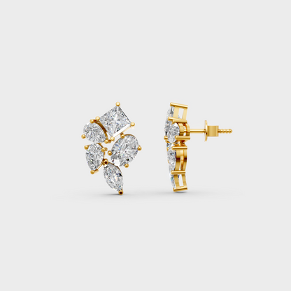 Close-up shot of 2.40 Carat Multishape (Princess, Pear, Oval, Marquise) Lab-Grown Diamond Stud Earrings set in 14K Yellow Gold.