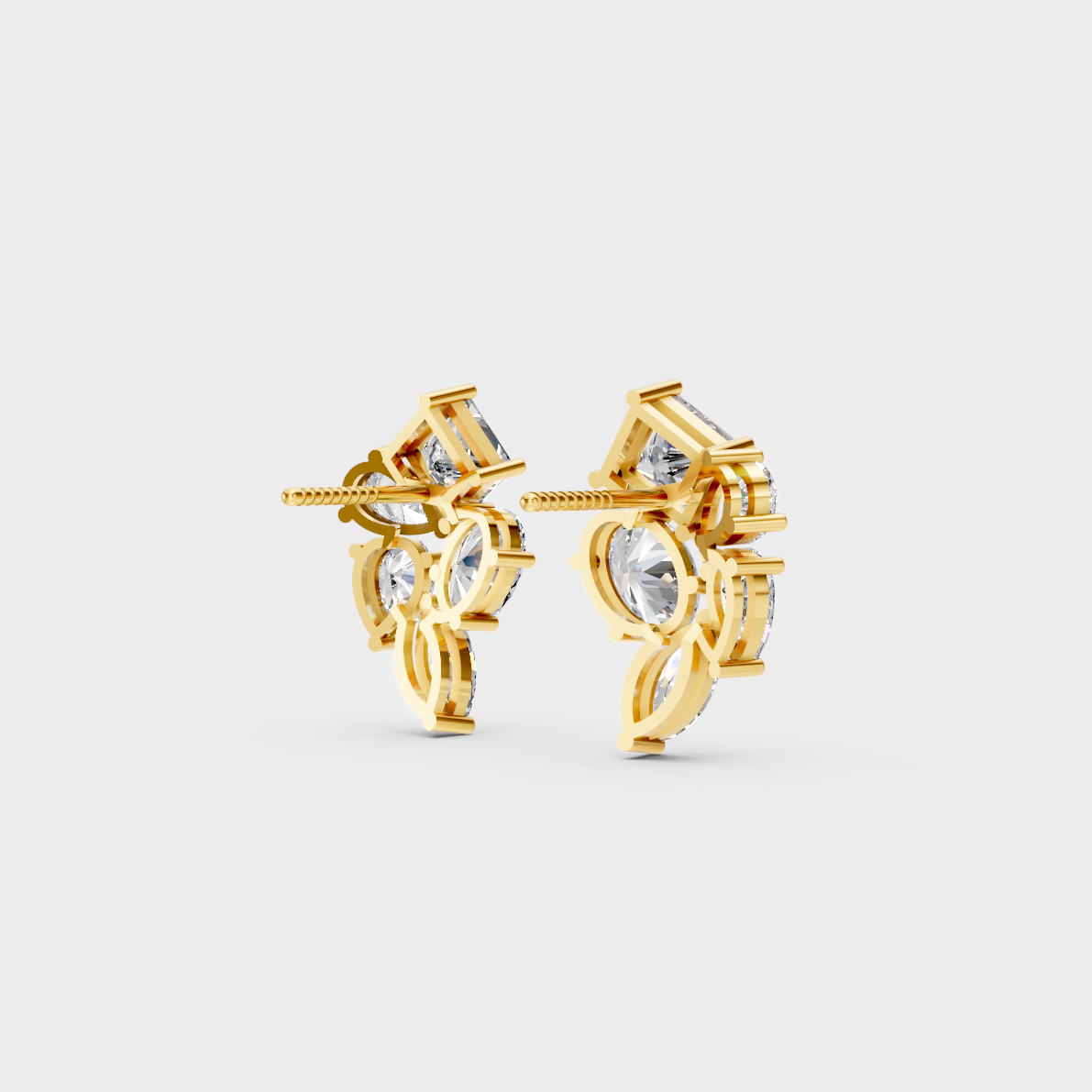 Macro studio lighting catching the fire of Sustainable Mixed Cut Lab Diamond Stud Earrings in 18K Yellow Gold.