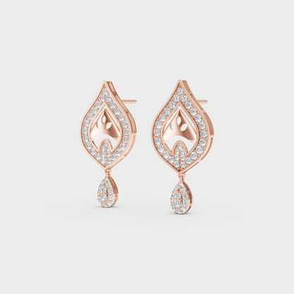 Pair of Ethical Luxury Diamond Solitaire Studs glowing on a rose-hued 18K Rose Gold Setting.