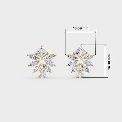 A pair of gold and clear gemstone stud earrings shown on a light gray background with dimension lines and measurements: 13.09 mm width and 14.