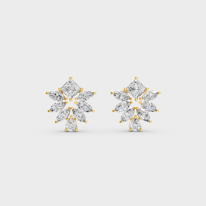On-model ear wearing a pair of 2.30ct Princess, Pear, and Marquise Lab Diamond Stud Earrings in classic 9K Yellow Gold.