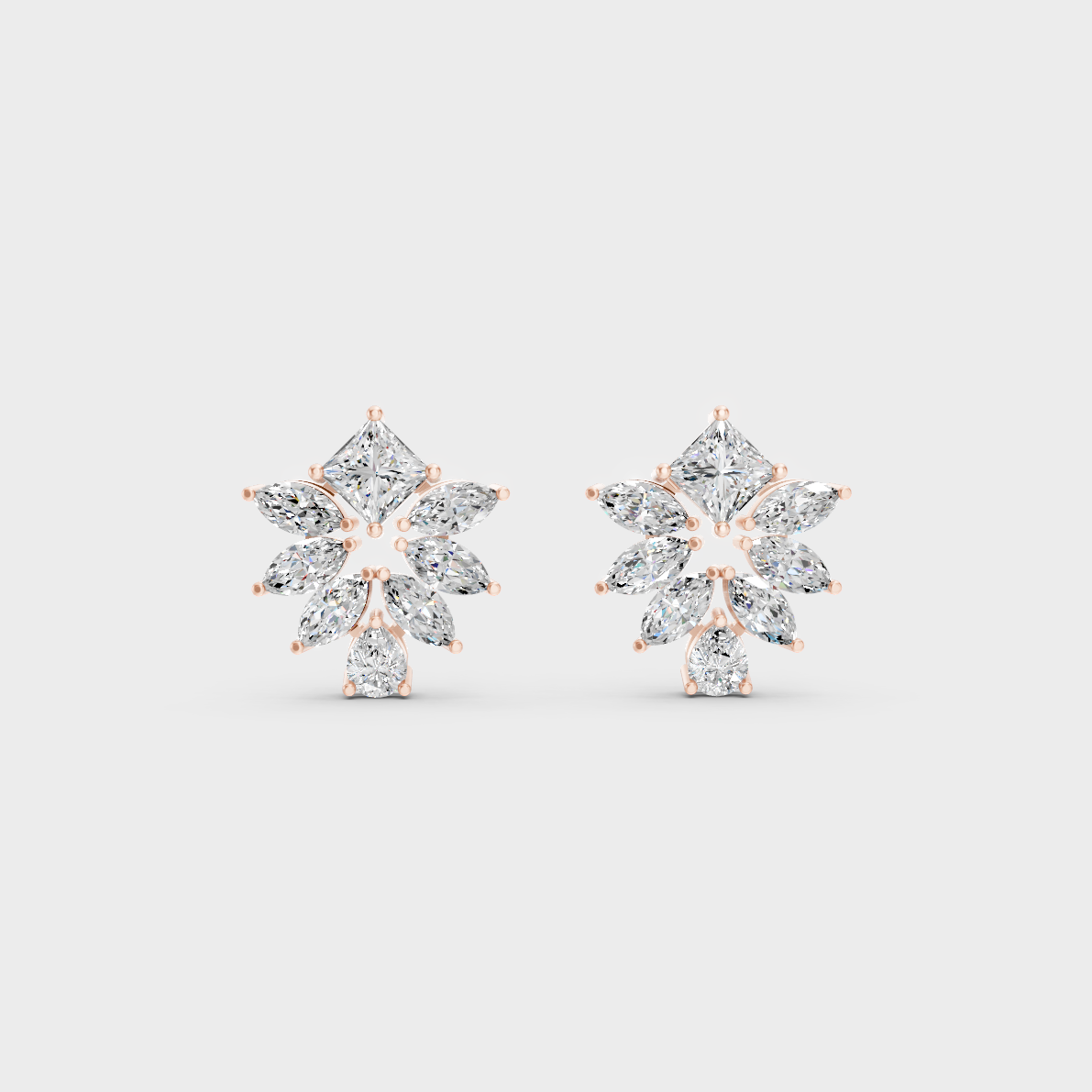 Top-down view displaying the Brilliant Sparkle of 2.30ct Princess, Pear, and Marquise Diamond Studs in 9K Rose Gold.