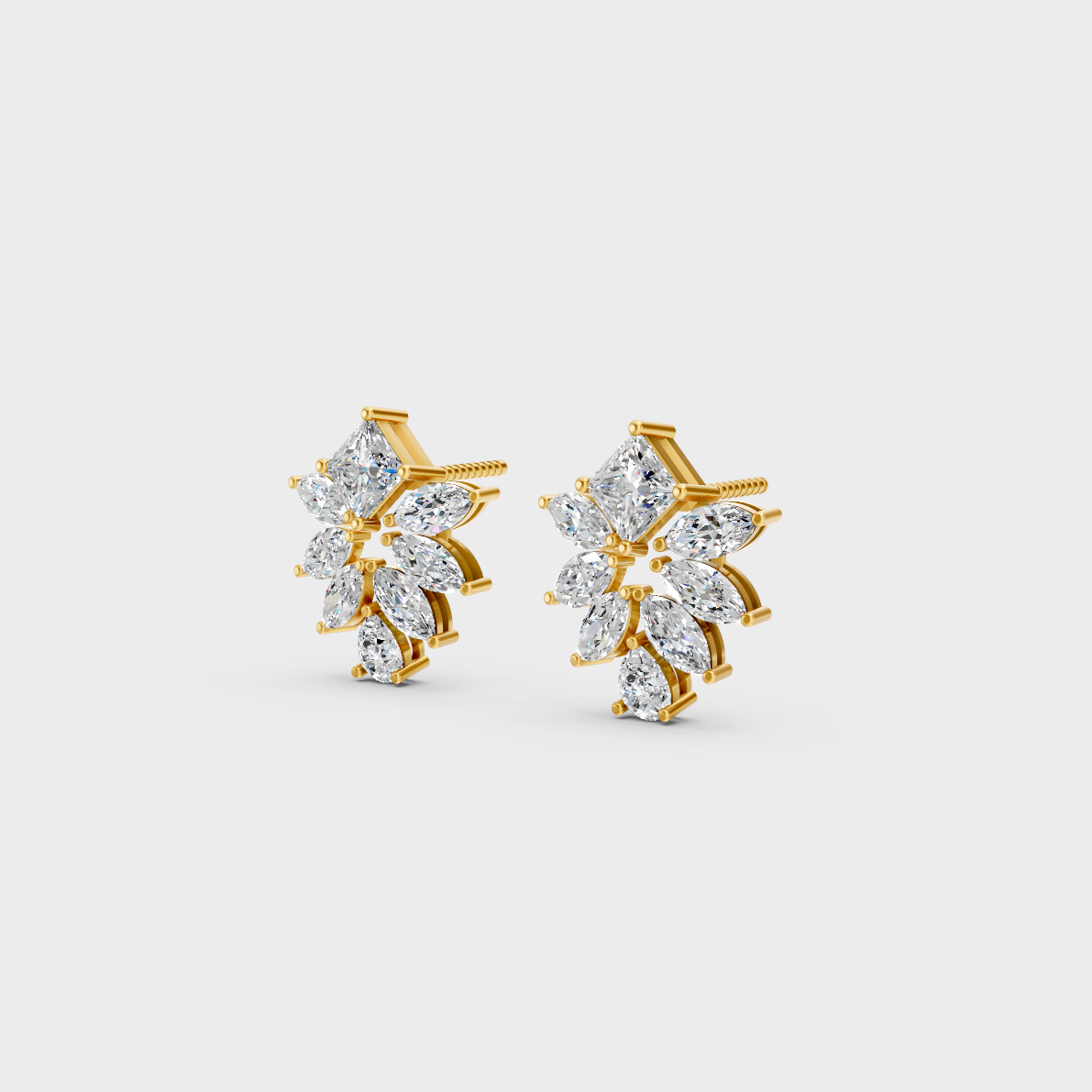 Side angle showing the secure backing and Brilliant Sparkle of Ethical Luxury Multishape Studs in 18K Yellow Gold.