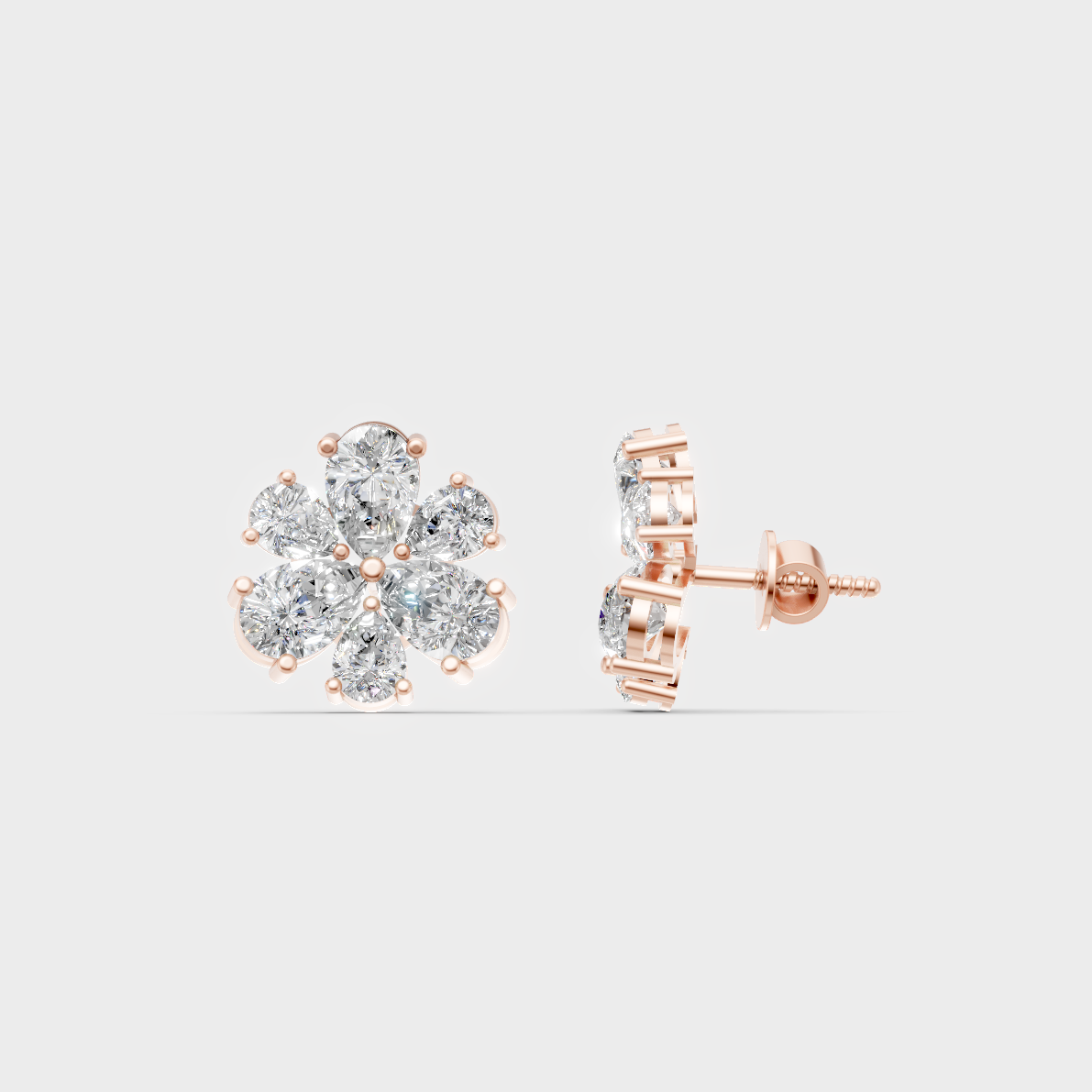 Romantic profile of 2.30 Carat Pear Cut Lab-Grown Diamond Stud Earrings in blush 14K Rose Gold.