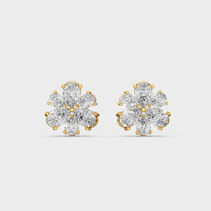 On-model ear wearing a pair of 2.30ct Pear Cut Lab-Grown Diamond Studs in classic 9K Yellow Gold.